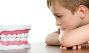 Чем опасен скрежет зубами?
