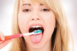 Чистка языка в стоматологии